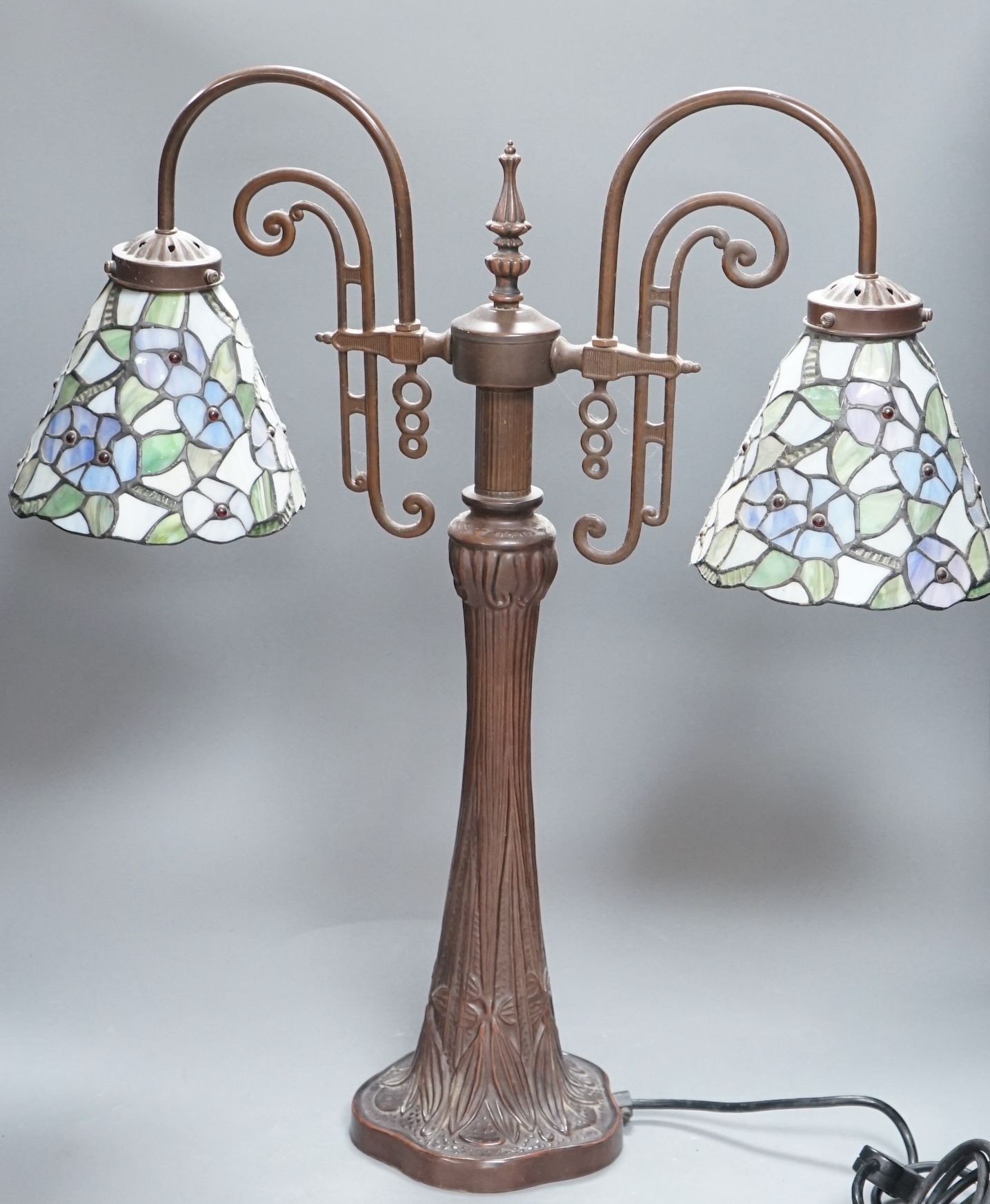 A Tiffany style two branch table lamp, 62cms high